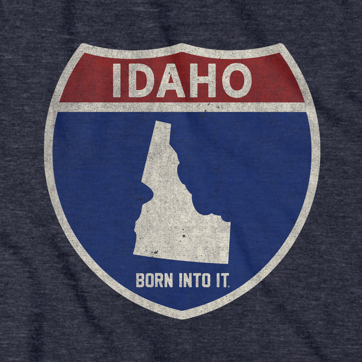 Born Into It Idaho Interstate Sign T-Shirt showing a graphic of the Idaho highway sign on a black fabric tee.