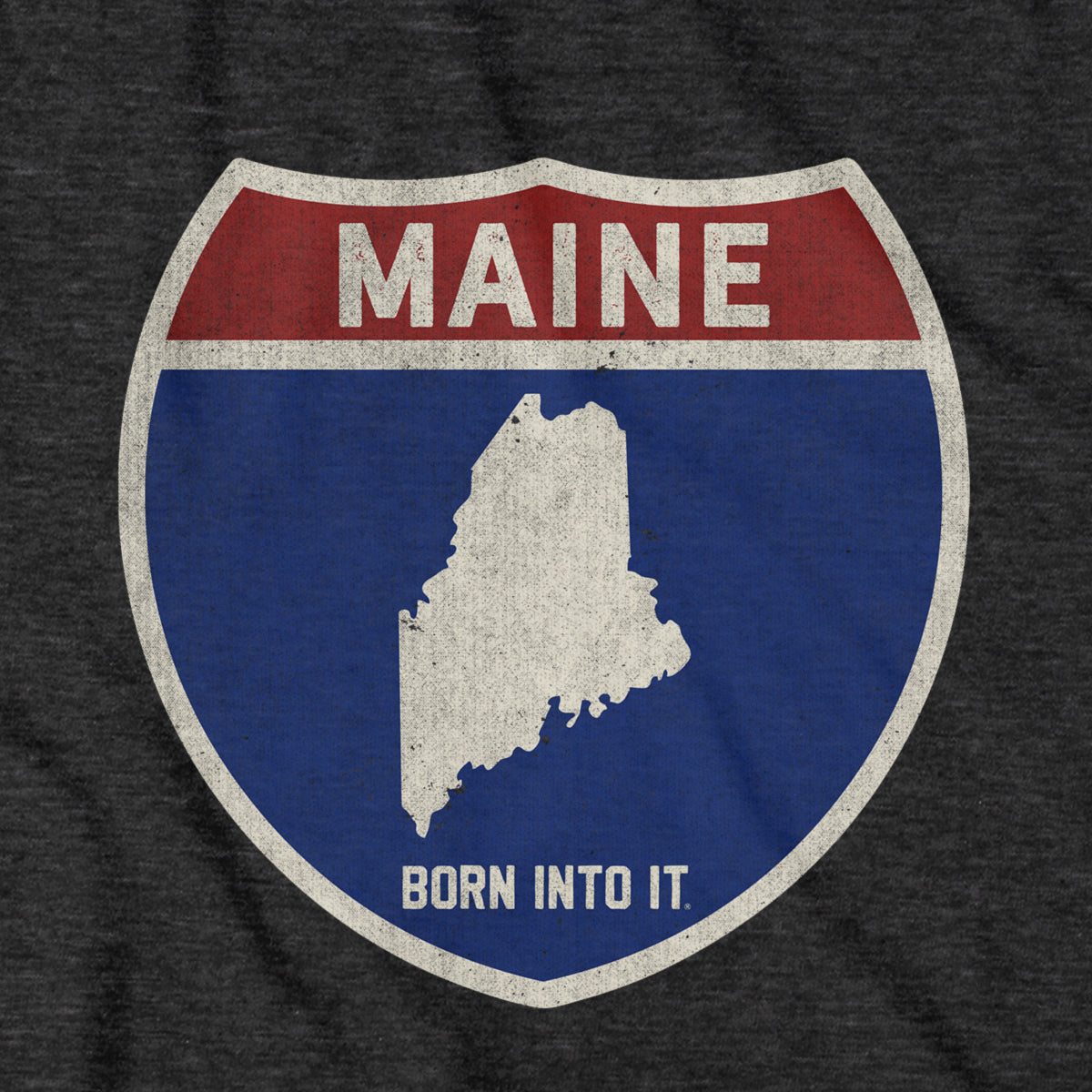 Born Into It Maine Interstate Sign T-Shirt featuring a bold graphic of the Maine interstate highway on soft cotton fabric.