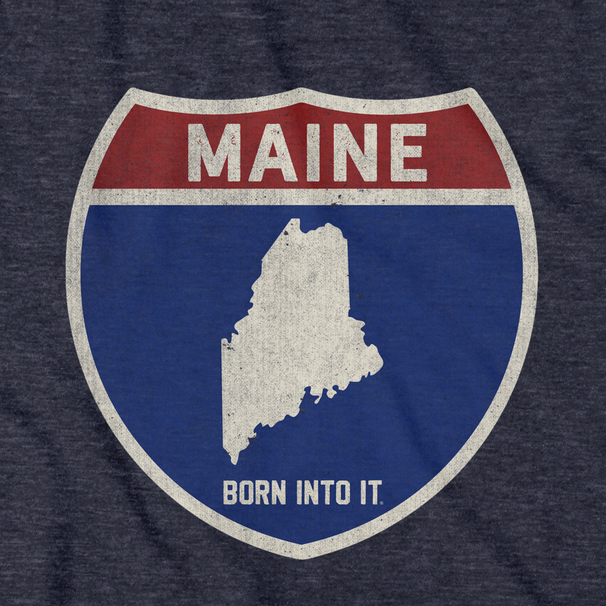 Born Into It Maine Interstate Sign T-Shirt featuring a graphic of the Maine state highway sign on soft cotton fabric.