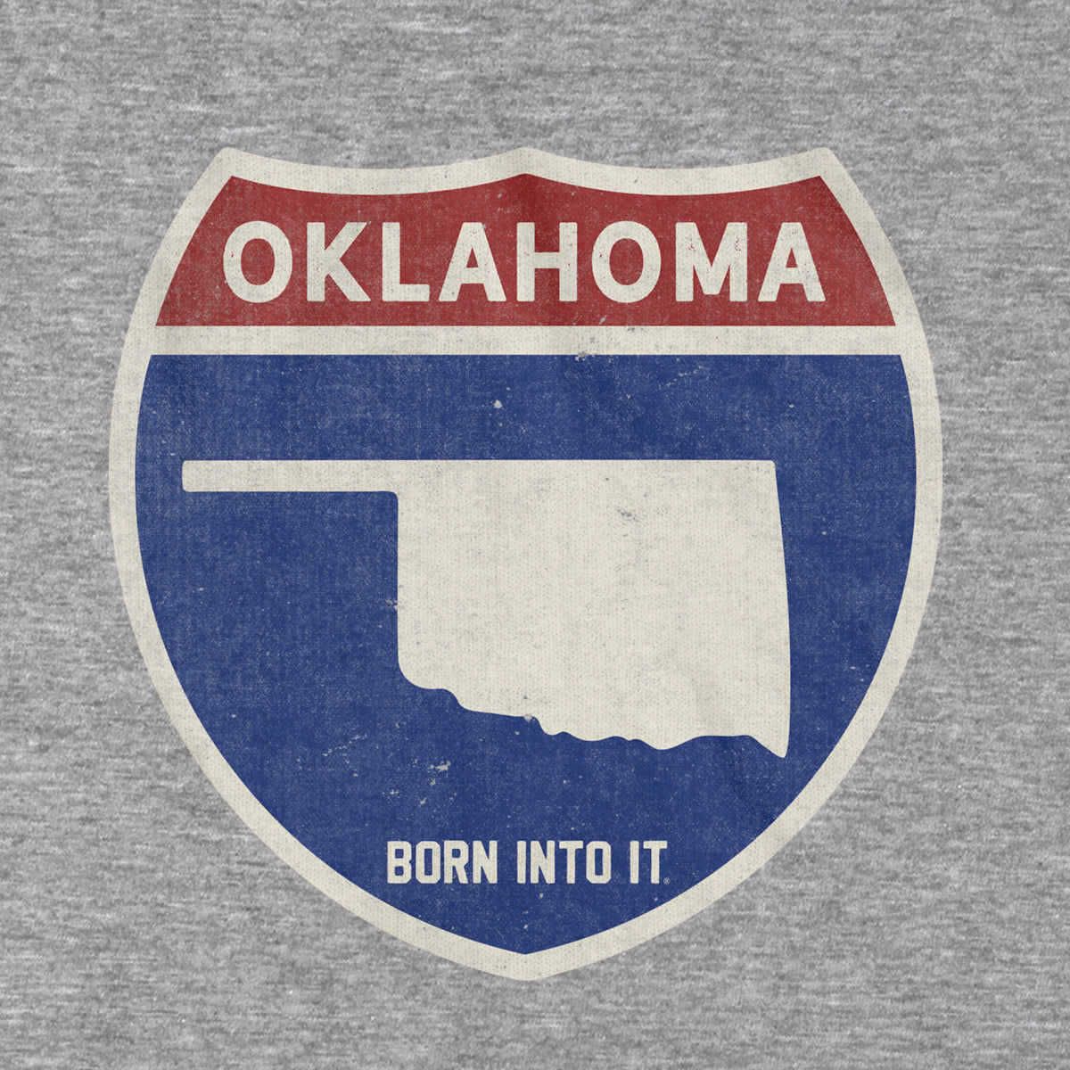 Born Into It Oklahoma Interstate Sign T-Shirt in gray, featuring a highway sign graphic on the front.