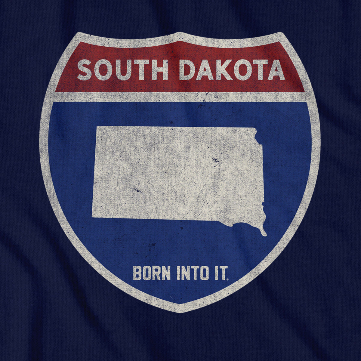 Born Into It South Dakota Interstate Sign T-Shirt featuring a graphic of the SD interstate sign on soft fabric.