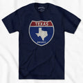 Born Into It Texas Interstate Sign T-Shirt featuring a colorful map of Texas, New York, and Utah on a casual graphic tee.