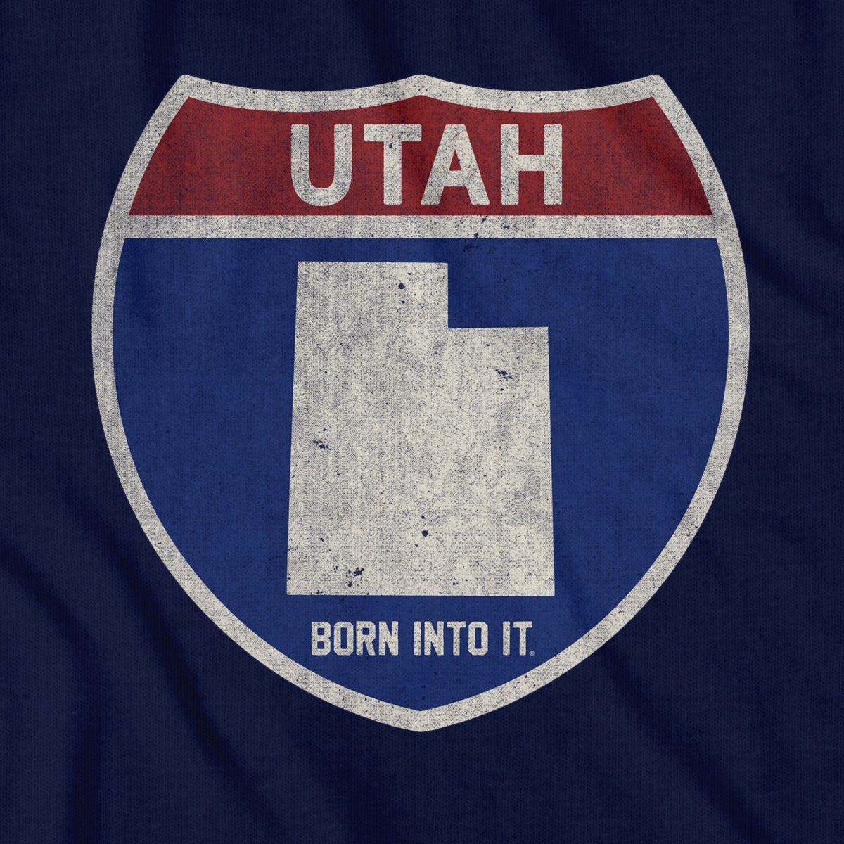 Born Into It Utah Interstate Sign T-Shirt showing a highway sign graphic in black and white on a casual T-shirt.
