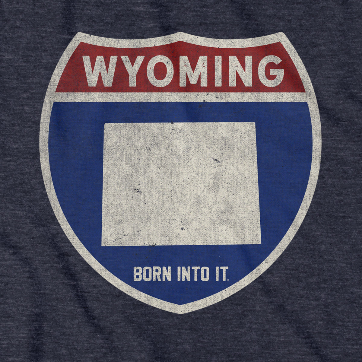 Born Into It Wyoming Interstate Sign T-Shirt featuring a vintage-inspired highway sign graphic on soft cotton fabric.