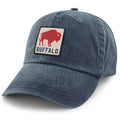 Born Into It Buffalo Town Square Dad Hat, with a square logo patch, in a classic style and neutral color.