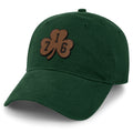 Born Into It Buffalo 716 Shamrock leather patch dad hat showing green fabric, shamrock patch, and curved brim.