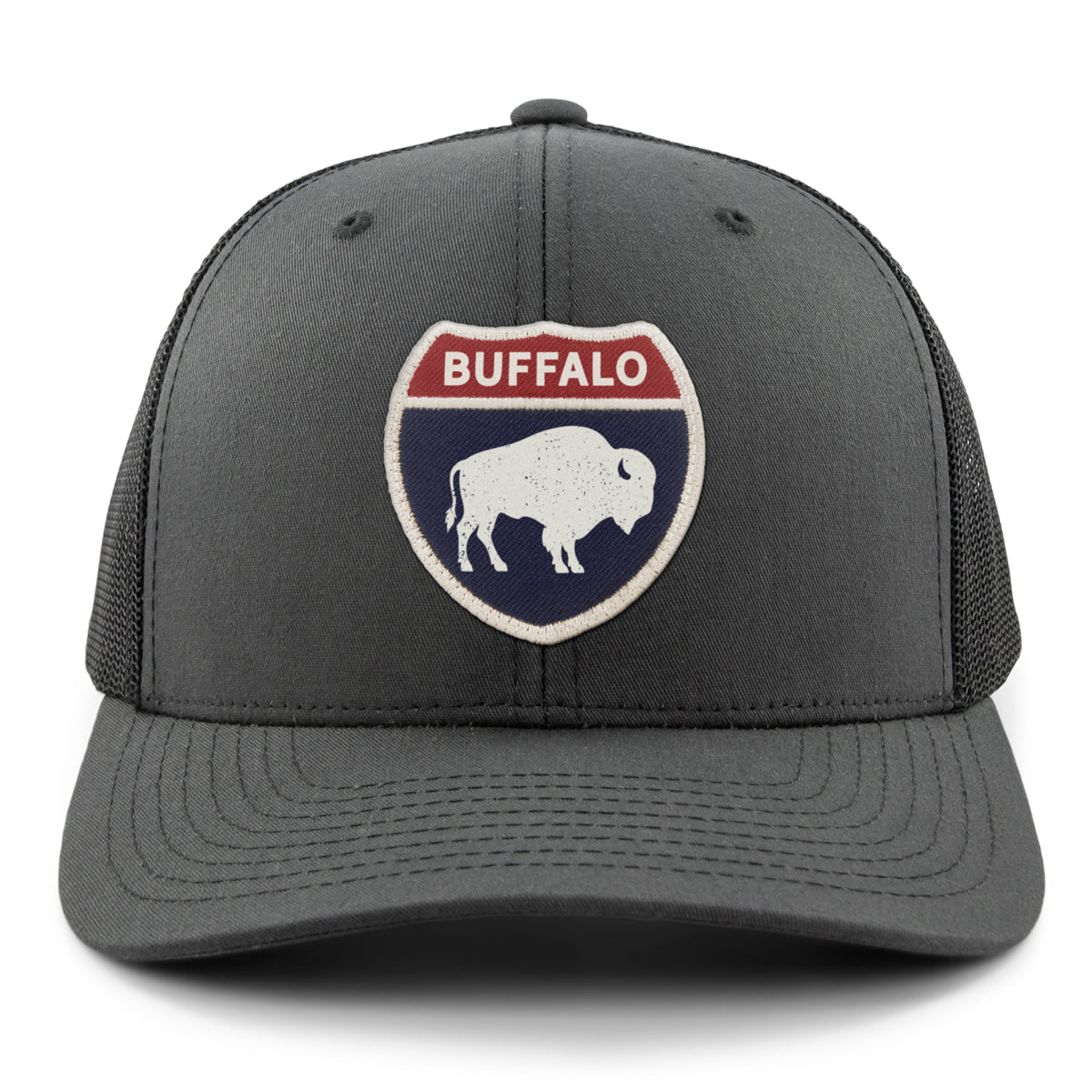Born Into It Buffalo Interstate Sign snapback trucker hat featuring a classic Buffalo Interstate design on front panel.
