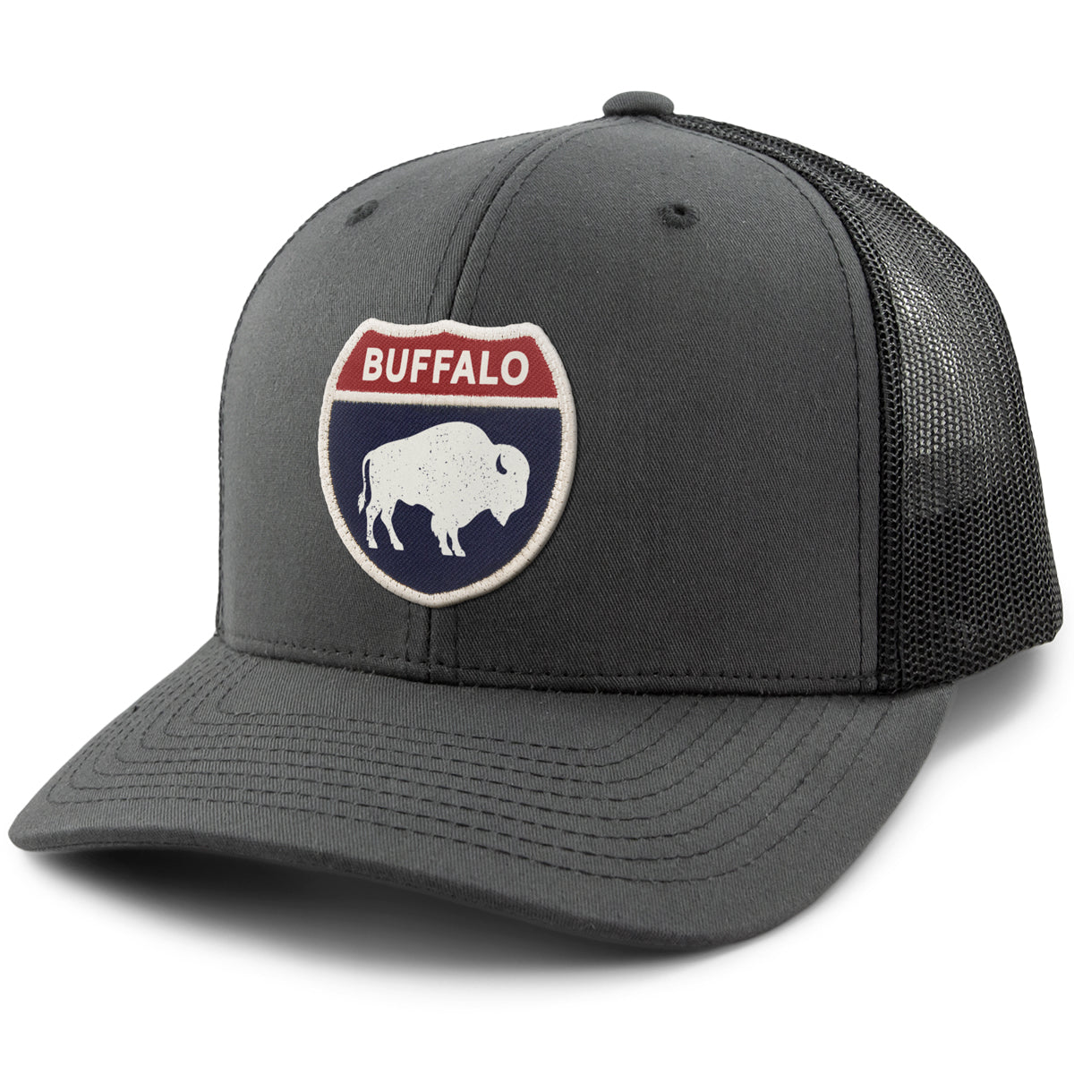 Born Into It Buffalo Interstate Sign classic snapback trucker hat, front view showing bold logo and mesh back design