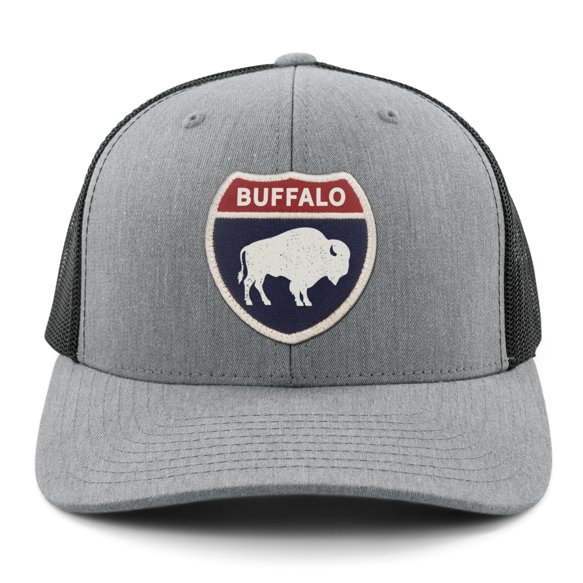 Born Into It Buffalo Interstate Sign classic snapback trucker hat with gray front panel and adjustable brim.