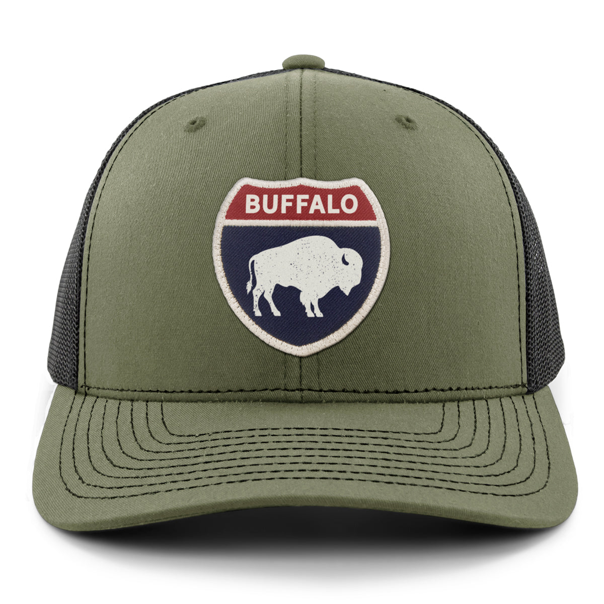 Born Into It Buffalo Interstate Sign snapback trucker hat with front graphic and mesh back, classic trucker cap style.